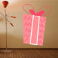 Pink gift box die-cut decal with white ribbon and bow, zigzag pattern