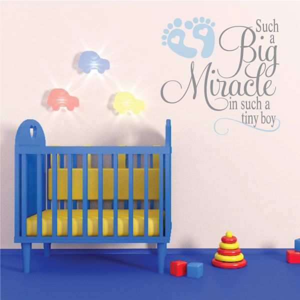 Baby wall decal with footprints, colorful baby silhouette, and quote text