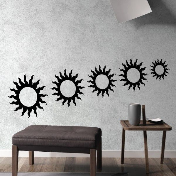 Sunburst sun flares wall decal set with five black sun icons