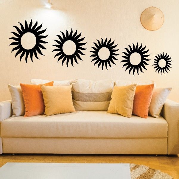 Sun flare family kit decal set with five black sunburst circles on wall
