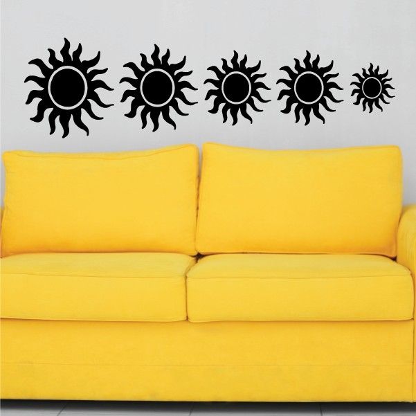 Set of black sun flare decals with five round sunburst icons