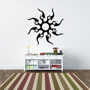 Tribal sunburst wall decal with black sun and spiky rays