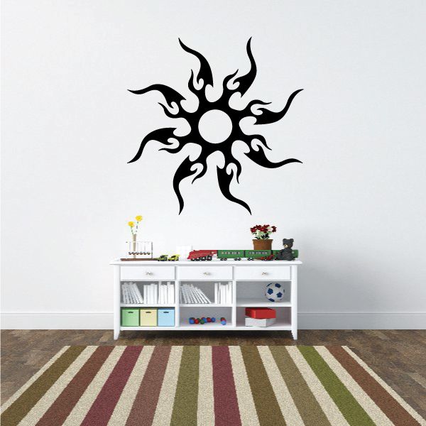 Tribal sunburst wall decal with black sun and spiky rays