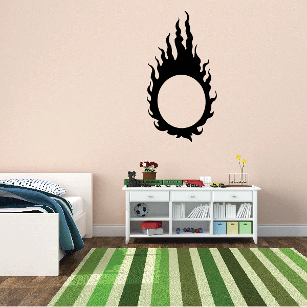 Flame wall decal with black flames around a cream center circle