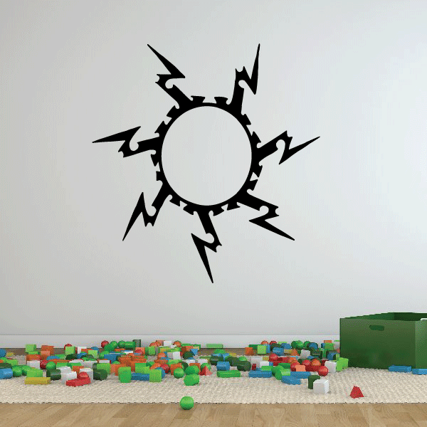Black sunburst wall decal with circular center and jagged rays, vinyl
