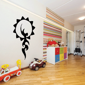 Vinyl wall decal of black floral sun with white center and dangling curve