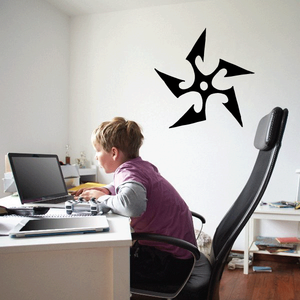 Black vinyl sun wall decal with eight-point starburst design