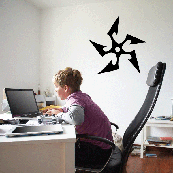 Black vinyl sun wall decal with eight-point starburst design