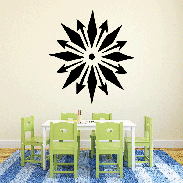 Black sun wall decal with radiating spikes and central circle