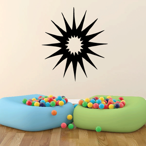 Sun wall decal with black starburst rays and yellow center vinyl sticker