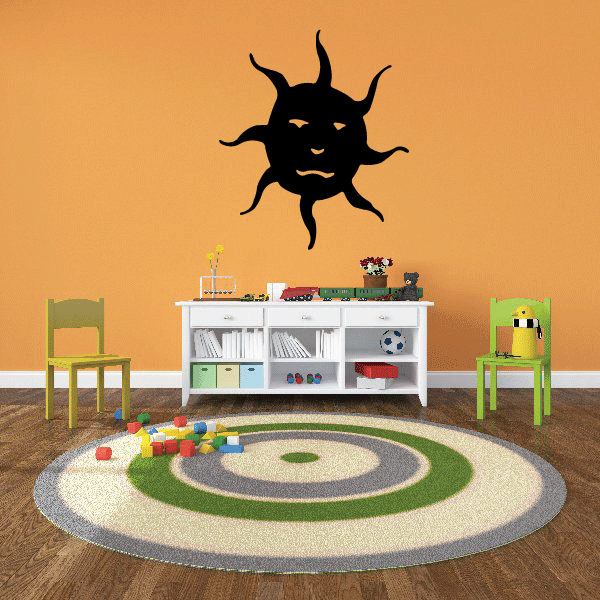 Black vinyl sun wall decal with smiling face and spiky rays