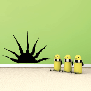 Vinyl wall decal: black sunburst with three small yellow characters with goggles