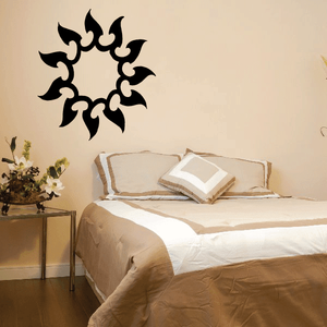 Black sun wall decal with spiky flame-like rays, vinyl sticker design