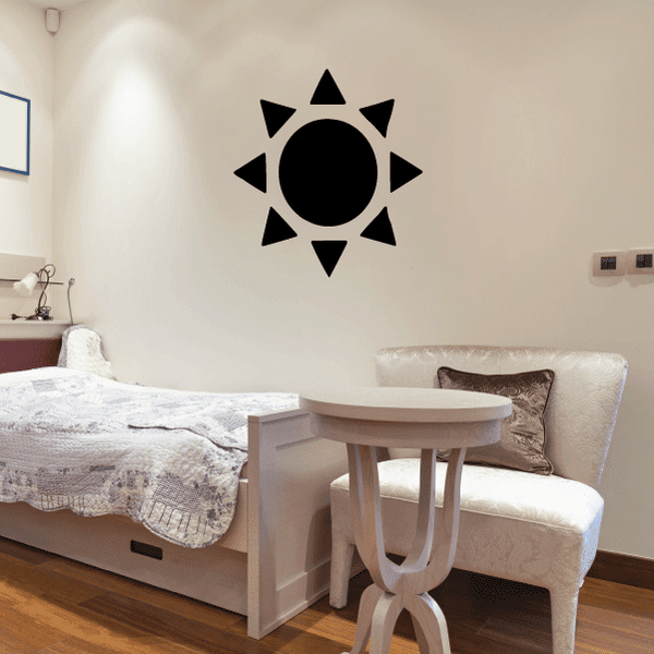 Sun wall decal with black circle and eight triangular rays