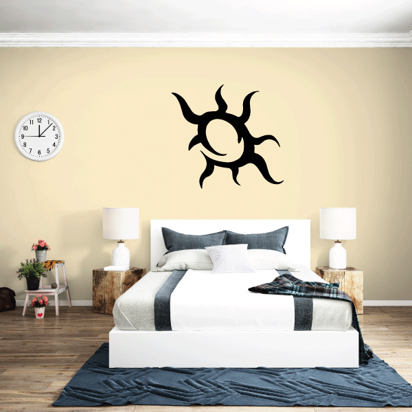 Black stylized sun wall decal with curling rays and face