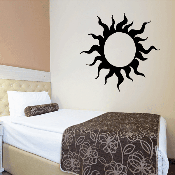 Black sun wall decal with circular center and flame-like rays