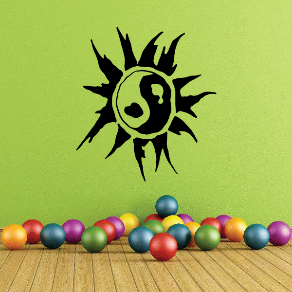 Vinyl wall decal with black sunburst yin-yang symbol