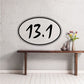 Marathon sticker with oval border and bold black “13.1” text