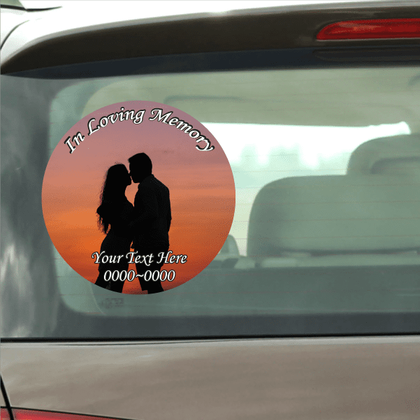 Round memory sticker: orange sunset, couple silhouettes, 'In Loving Memory' text