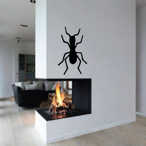 Ant decal with black ant silhouette on wall