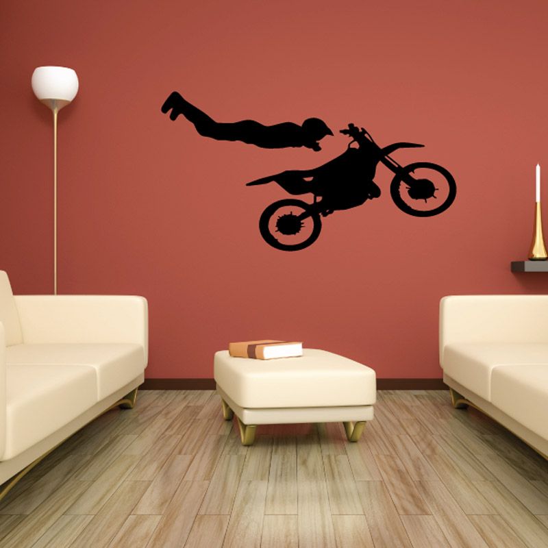 Dirt bike air decal with black rider silhouette and flying wheels