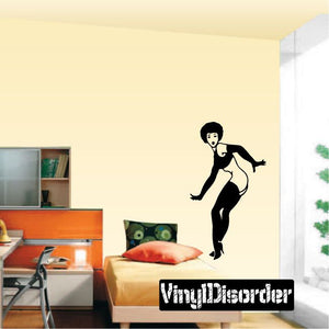 Vinyl decal of a surprised woman silhouette, black figure with open skirt and legs