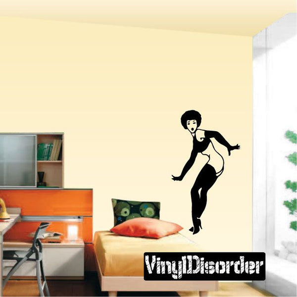 Vinyl decal of a surprised woman silhouette, black figure with open skirt and legs