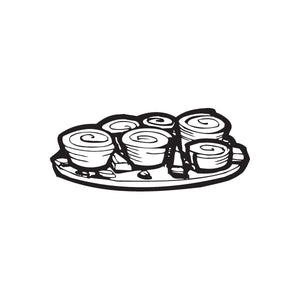 Sushi on a plate decal featuring black-and-white sushi rolls