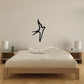 Swallow outline wall decal, black stylized bird silhouette.