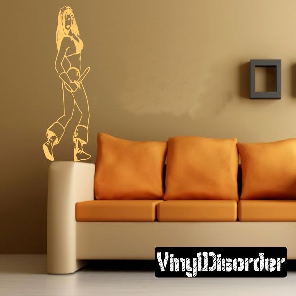 Gold line-art swashbuckling woman wall decal, full-body pose.