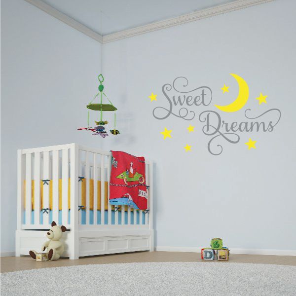 Sweet Dreams moon wall decal with crescent moon, stars, and hanging charm details