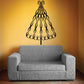 Black swirled ribbon Christmas tree wall decal with bow on top