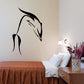Black swooping dolphin wall decal with curved flippers