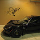 Swooping falcon decal, black line-art bird with wings spread