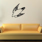 Black swooping falcon wall decal with stylized line wings and tail