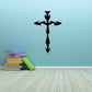 Symmetrical tribal cross decal in black with ornate, pointed arms