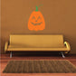 Orange jack-o-lantern die-cut decal with smiling face and green stem