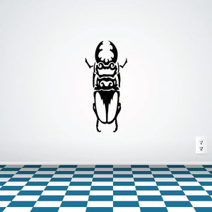 Tall upward tribal beetle decal, black silhouette