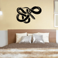 Black tangled snake decal with looping knot design for wall decor