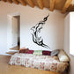 Black dolphin tattoo style wall decal with barbed wire accents