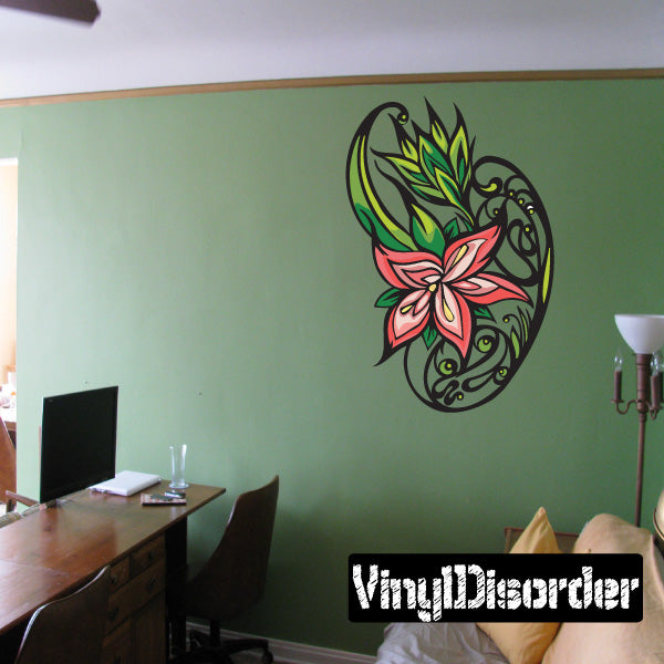 Ornamental floral vine wall sticker with pink and green petals and black scrollwork