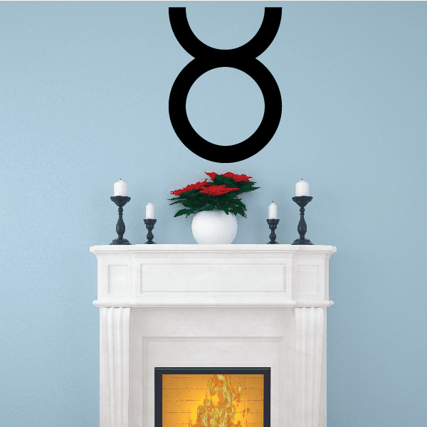 Taurus zodiac symbol decal, bold black bull-like sign on wall
