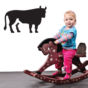 Black bull wall decal silhouette with horns and legs, taurus-style figure
