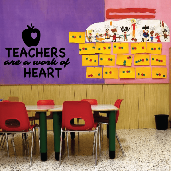 Wall decal text "Teachers are a work of Heart" with black heart icon