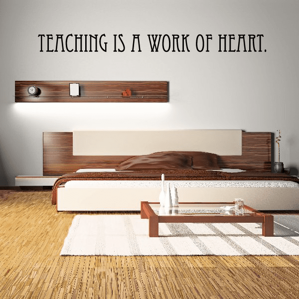 Teaching is a work of heart wall decal with bold black lettering
