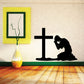 Praying teen wall decal showing a kneeling figure with a cross