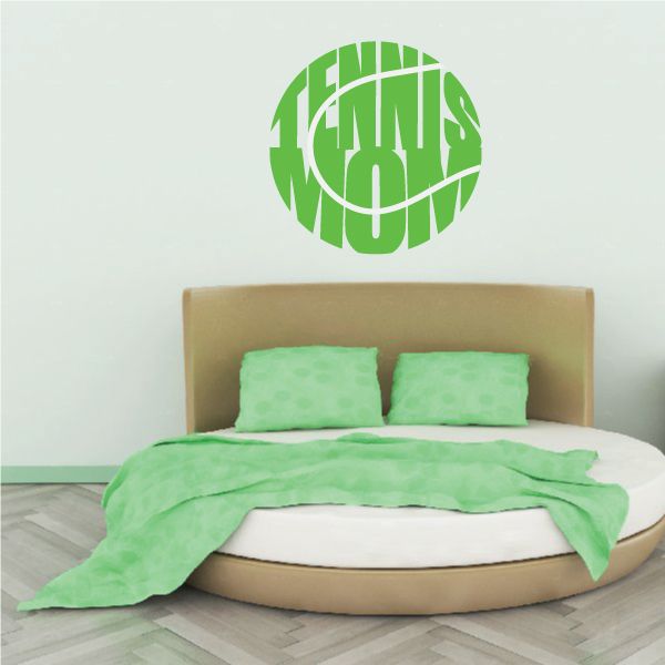 Tennis Mom wall decal, green circular design with tennis rackets and white lettering.