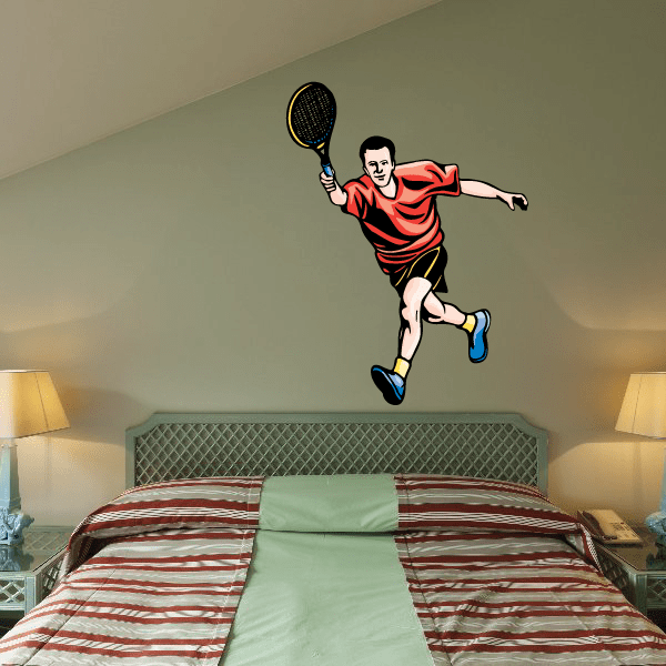 Tennis wall decal of a man in red shirt swinging a racket, black shorts, blue shoes.