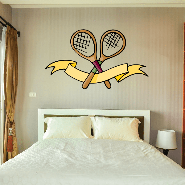 Tennis wall decal of two crossed rackets with banner and green ribbon