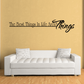 Wall decal with black script quote: “Best things in life aren't things”